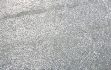 Helions Bumpstead laminate fibreglass or shingles?